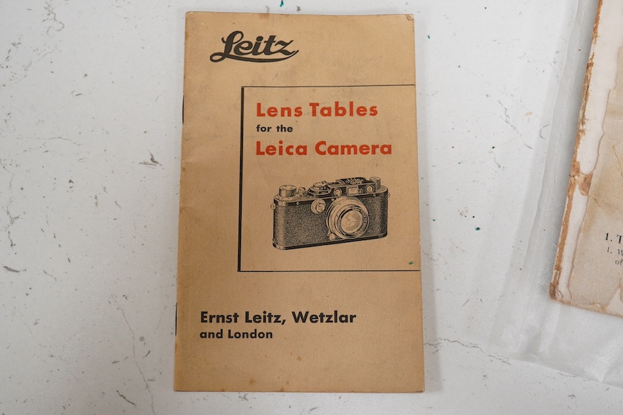 A Leica Model II camera in leather case, together with an Elmar 4.5/135mm lens, lens table booklet and instruction booklet. Condition - poor to fair.